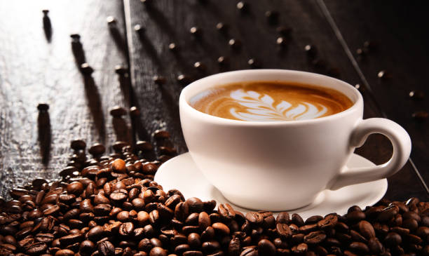 istock Composition with cup of coffee and beans 1199458259