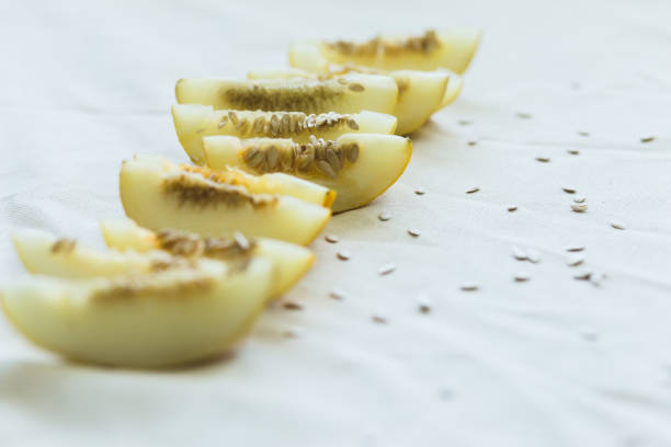 Fresh melon seeds closeup as texture background.