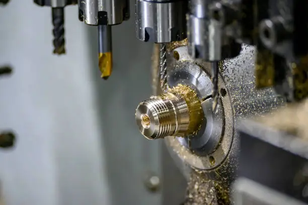 Photo of The muti-tasking CNC lathe machine making the brass screw connector parts.