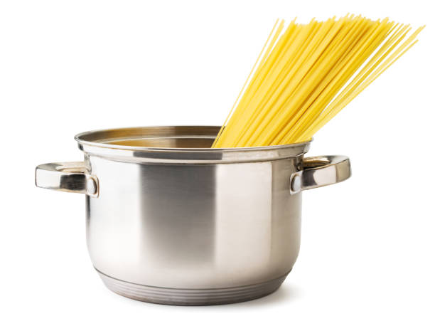 istock Spaghetti in a pan on a white background. Isolated 1199464185