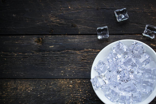 istock ice cubes. artificial crystal clear transparent piece. concept. food background. top view. copy space 1199466664
