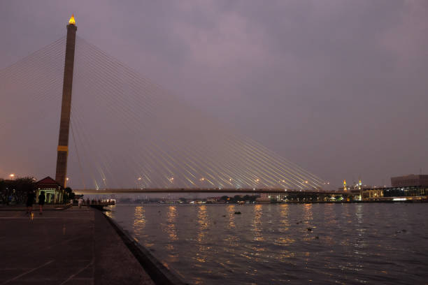istock A huge bridge over the Chao Phraya River in Bangkok at night. 1199466763