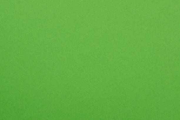 istock Green paper abstract background. Close-up, paper texture 1199472579