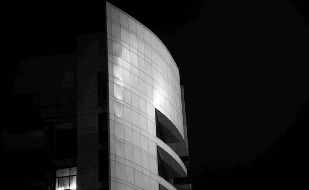istock White structure of a modern building at night 1199475130