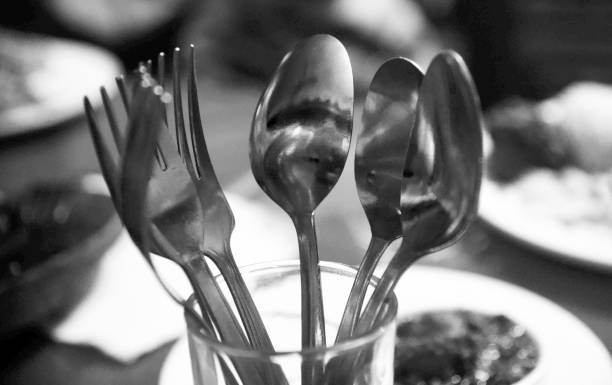istock Metallic spoons and forks isolated object photo 1199475255