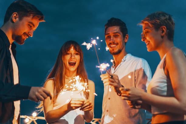 istock Friends enjoying a rooftop party 1199476203