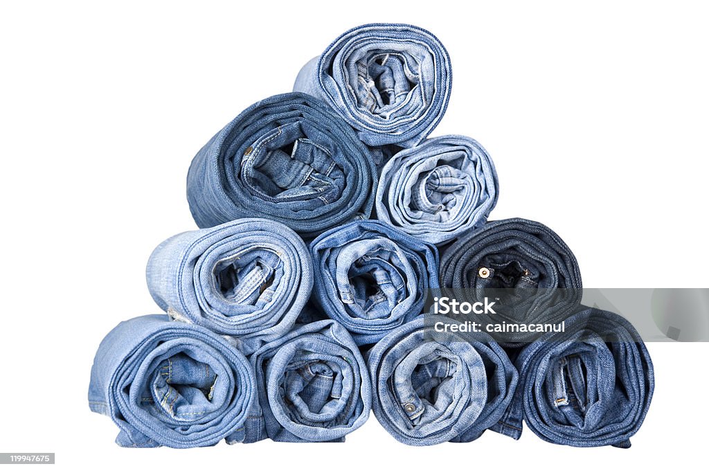 Rotolo di jeans in denim blu - Foto stock royalty-free di Denim