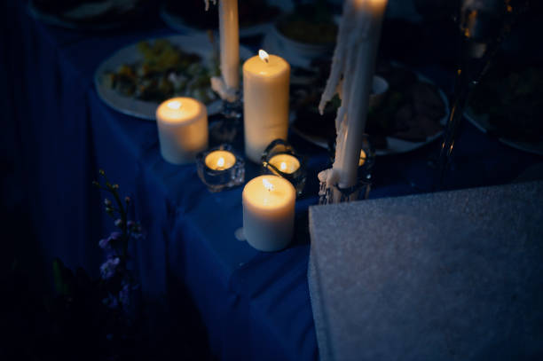 istock Burning candles on a festive table. A festive table with candles 1199477213