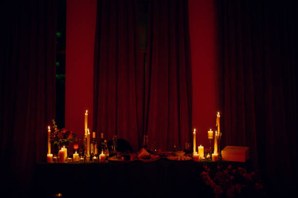 istock Burning candles on a festive table. A festive table with candles 1199477226