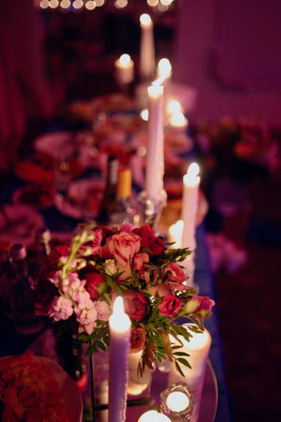 istock Burning candles on a festive table. A festive table with candles 1199477233