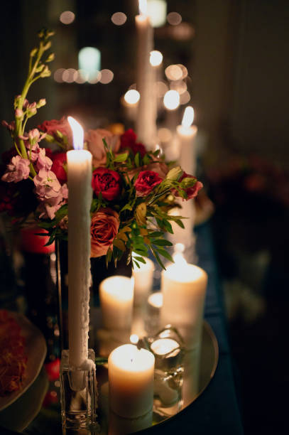 istock Burning candles on a festive table. A festive table with candles 1199477234