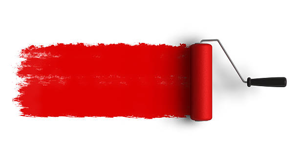 Red roller brush with trail of paint