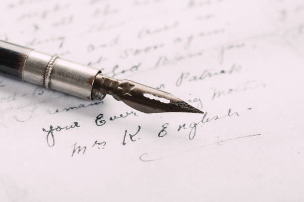 istock fountain pen on paper with ink text closeup 1199479852