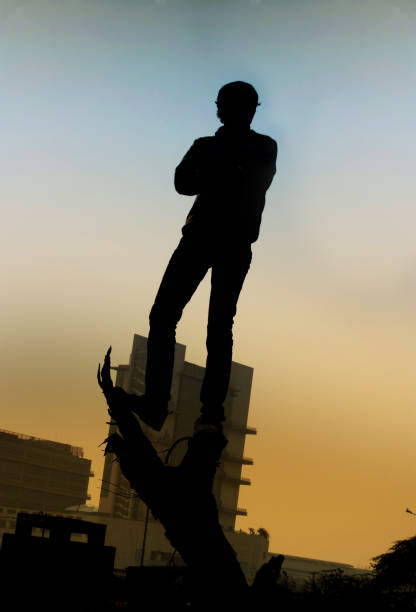 silhouette of the equestrian statue of the Duke of Wellington (1769-1852) in front of the Register House in the Scottish capital Edinburgh. The statue was created by the Scottish sculptor Sir John Steell (1804-1891) and unveiled in 1852; Edinburgh, Scotland