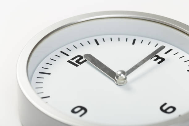istock white with light metal minimalistic wall clock close-up on a light background 1199479948