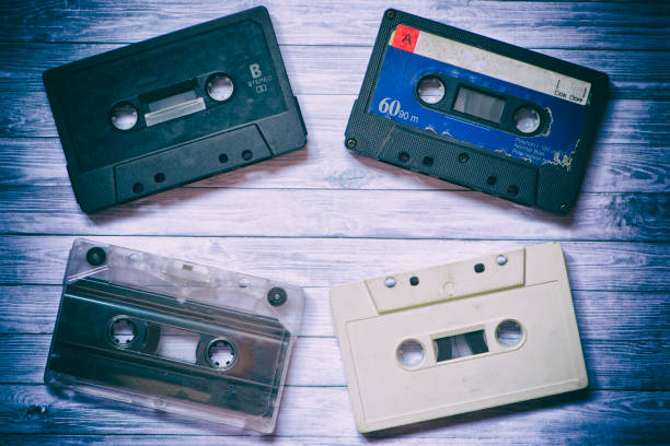 istock Old cassette tapes with a wooden background 1199480152