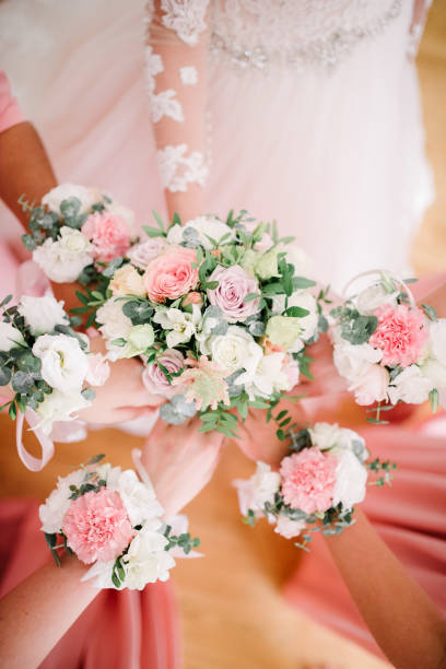 istock Bridesmaids bridesmaids from flowers on their hands 1199482642