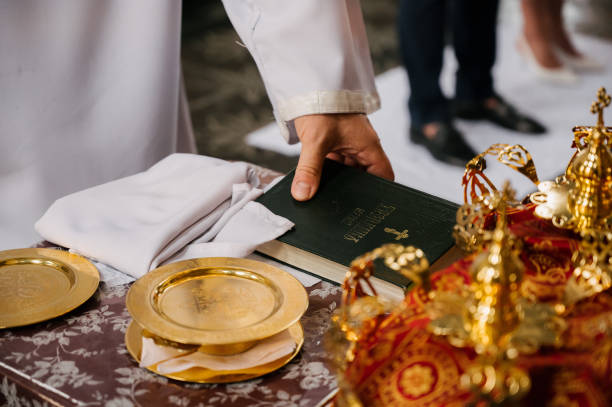 istock Two wedding crowns in church close up 1199482653