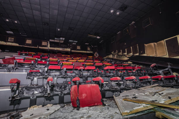 istock Red seats in a abandoned cinema 1199484272