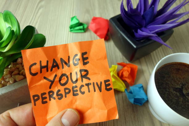 istock Slogan change your perspective handwritten on sticky note 1199490489