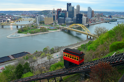 Pittsburgh, PA, USA May 5, 2014 The Duquesne funicular climbs a cliff, offering splendid views of the Pittsburgh, Pennsylvania skyline