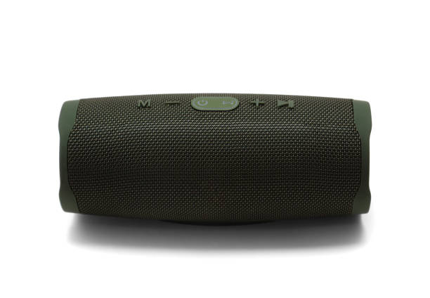 Portable bluetooth army green speaker isolated on white background.
