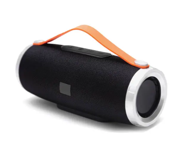 Black Portable Bluetooth Speaker with silicone orange handle isolated on White Background side view