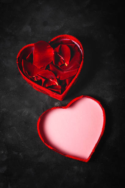 istock Composition of red roses and gift boxes 1199491846
