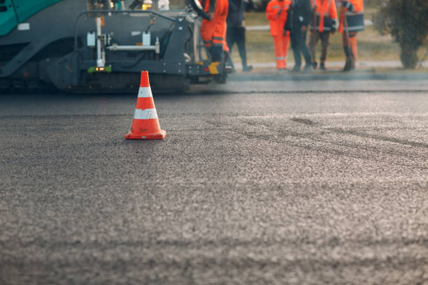 istock Asphalt paving. Paver machine and road roller. New road construction. 1199494803