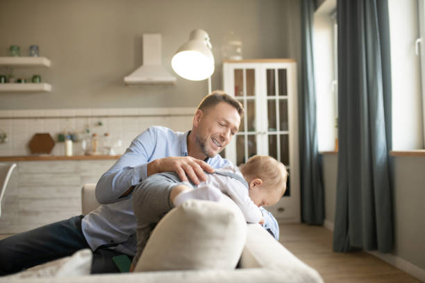 istock Mature father spending his time at home with his kid 1199495272