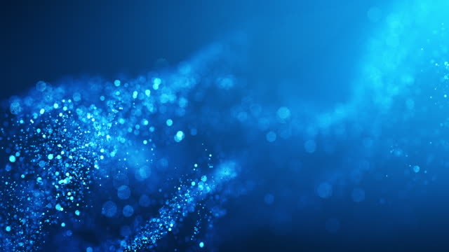 Digitally generated abstract background animation, seamlessly loopable. Beautifully glittering particles floating through space, constantly changing their form. Perfectly usable for all kinds of topics.