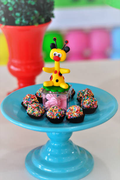 istock Blue dish with various brigadeiros with colorful chocolate on the table 1199496925