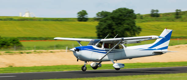istock Light aircraft landing on aerodrome runway 1199500006
