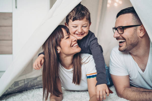 istock Happy young family with a boy 1199501213