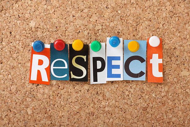 tacked letters of different fonts spell out respect on cork - respect stockfoto's en -beelden