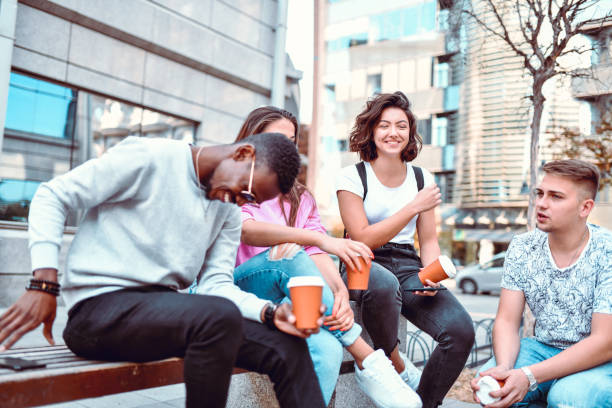 istock Friends Of Different Races Hanging Out Downtown 1199502299