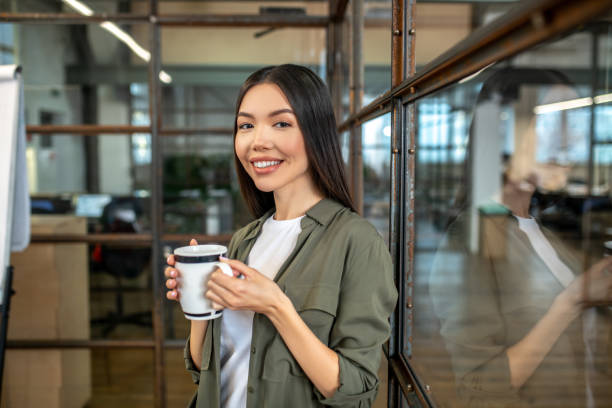 istock Long-haired brunette asian pretty girl smiling nicely 1199502352