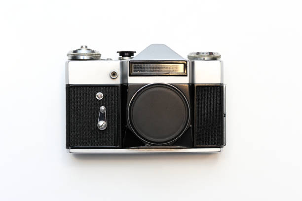 istock Vintage film camera in a white background 1199505454