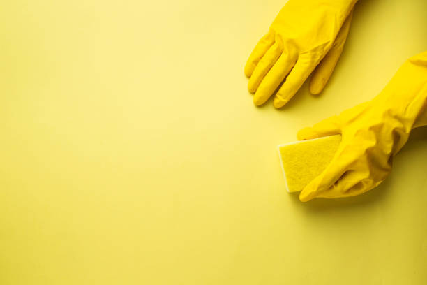 istock Kitchen sponges and rubber gloves 1199505461