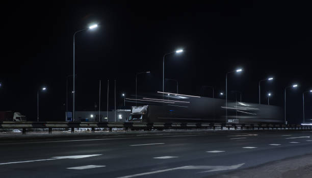 istock Truck traffic on a winter highway 1199511015