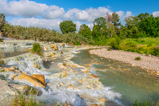 Natural spa with waterfalls and hot springs at Saturnia thermal baths, Grosseto, Tuscany, Italy.