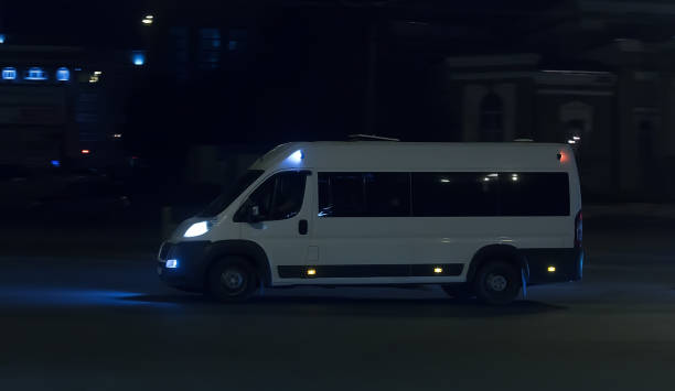 istock Minibus Driving Night City 1199511868
