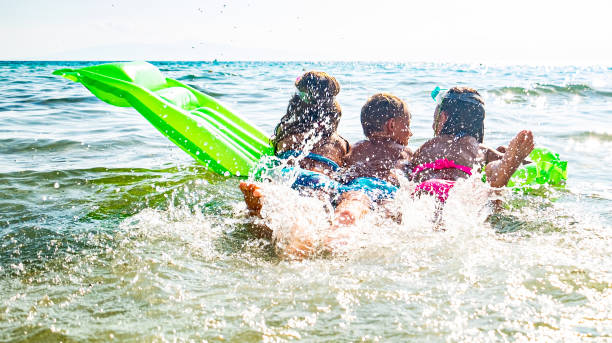 istock Kids in the sea 1199517538