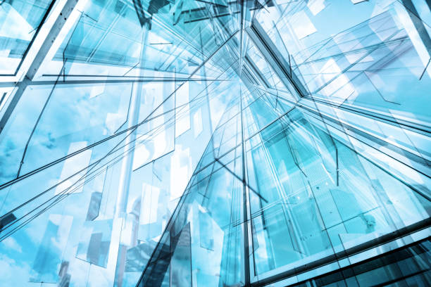 istock Abstract reflections of finance buildings seen from below 1199520557