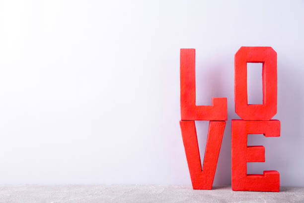 istock Red letters love on grey background. LOVE word. 1199521260