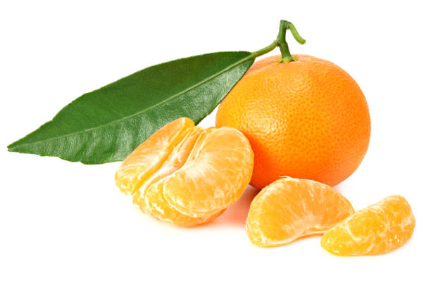 istock mandarin with slices and green leaf isolated on white background 1199521353