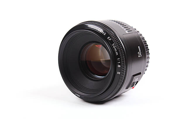 istock Black camera lens isolated in white background 119952385