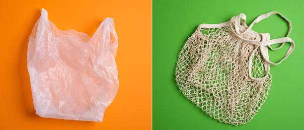 istock Disposable Plastic Polythene Bag vs Reusable Mesh Net Shopping Bag Cotton Eco Friendly Tote String. Comparison concept. Plastic free, Zero Waste, Sustainable Lifestyle 1199527203