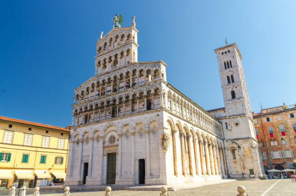 Chiesa di San Michele in Foro St Michael Roman Catholic church basilica on Piazza San Michele square in historical centre of old medieval town Lucca in summer day with clear blue sky, Tuscany, Italy Chiesa di San Michele in Foro St Michael Roman Catholic church basilica on Piazza San Michele square in historical centre of old medieval town Lucca in summer day with clear blue sky, Tuscany, Italy lucca stock pictures, royalty-free photos & images