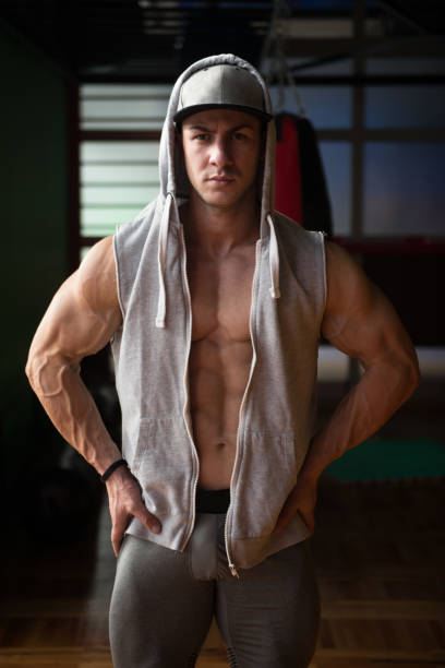 istock Healthy Man Showing Abdominal Muscle 1199536740